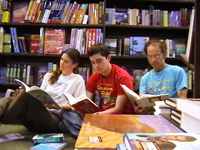 The Goza family reading in their "living room"