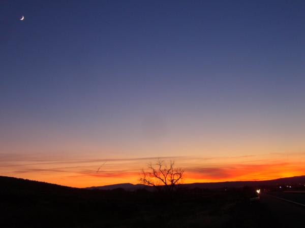 November - I-84 near Pendleton, OR 17th June, 2007.  There were many opportunities to take pictures of sunsets. This is one of my favourites, with the 'toe-nail' moon.
