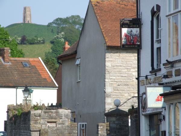 Glastonbury Tor, connected to many myths and legends, such as King Arthur. [Noticed the pub sign ?]
The famous festival is not in Glastonbury itself but a few miles away.