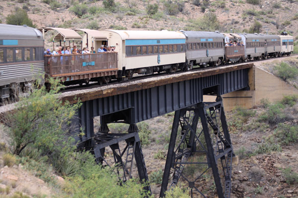 Cars of the Verde Canyon Railroad pass over this bridge.