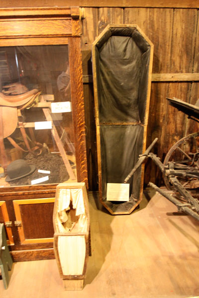 Viewing caskets (big and small) were on display inside the Birdcage Theatre museum in Tombstone, AZ.
