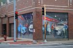 This mural is a tribute to Route 66.  It depicts the inside of a Bill Jacobs Chevrolet showroom back in the 1950s.