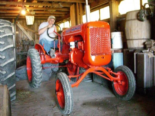 Grant Grundy's pride and joy, a fully restored old tractor which now only comes out for parades and shows.