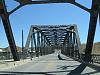 Old bridge over railroad tracks near Barstow station