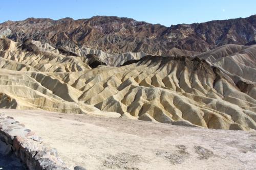 Zabriskie Point in Death Valley National Park shows badlands crafted from millions of years ago.
