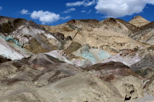 The highlight of Artists Drive is Artists Palette, where green and purple shades can be seen in Death Valley National Park.