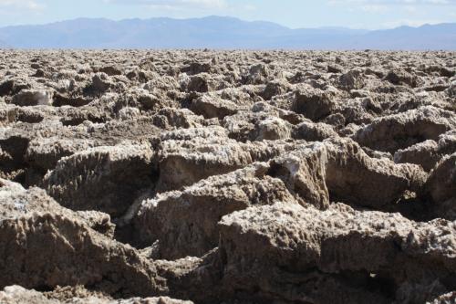 A visit to the Devil's Golf Course in Death Valley National Park shows salt mounds as far as the eye can see.