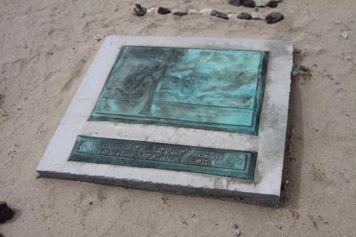The plaque by the U2 Joshua Tree is a play off one of the album's song titles.