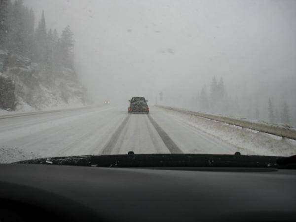 The last time I went over Wolf Creek Pass in Colorado, it was a one-lane dirt road. Now it's a white-out blizzard! Just our luck to hit a bad snowstorm.