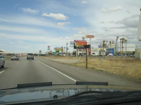 Crossing the state border at Primm, NV on I-15. Someday I'll get a picture of this stupid sign without something in the way.