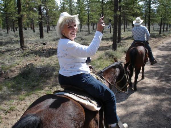 My mom leads the pack of tourists as our guide takes us to the north rim of Bryce Canyon National Park, UT