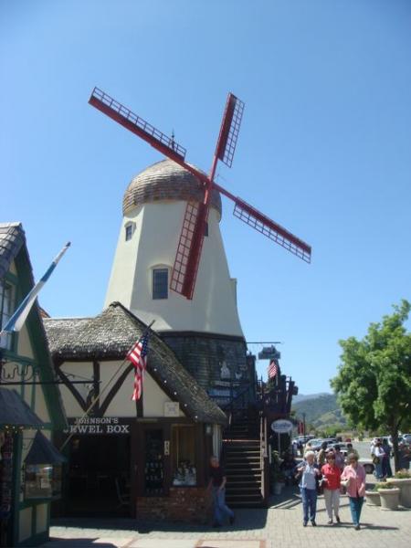Solvang, CA is a quaint little town with vintage architecture. You'll feel you should be this little toy figure in a model town.