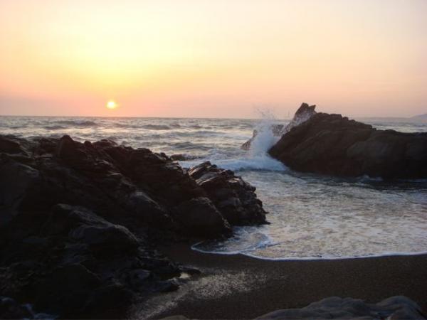 Here's a wide shot of the California coast at sunset, found on Moonstone Beach in Cambria, CA.