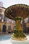 Old fountain in a square in Aix-en-Provence