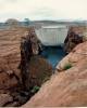 Glen_Canyon_Bridge_is_barely_visible_in_front_of_the_dam.jpg