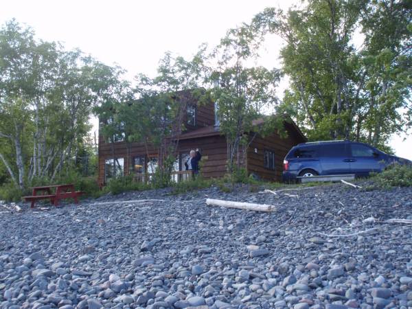 Cabin and Rocky Shore