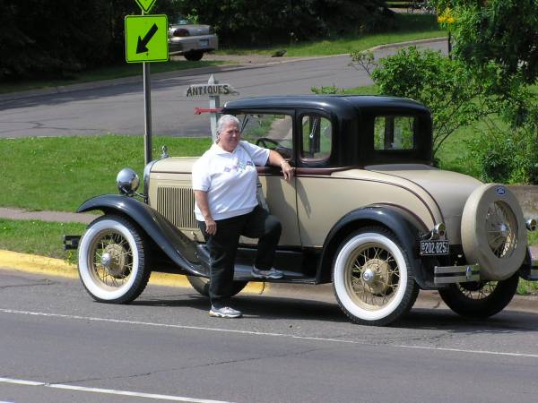 Betty and Old Car in Grand Marais