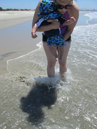 Grandson meets the Pacific Ocean.