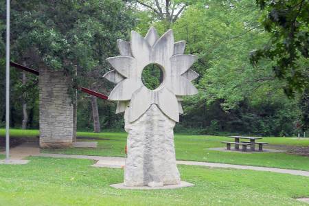 Post rock sunflower sculpture