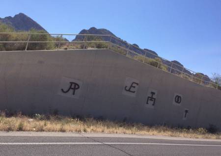 Cattle Brand road art Tucson