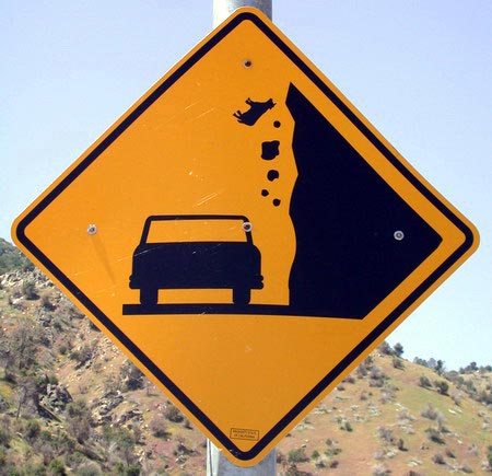 Falling Cow Sign