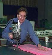 Charlie Brister demonstrates howa fabric cutter works
